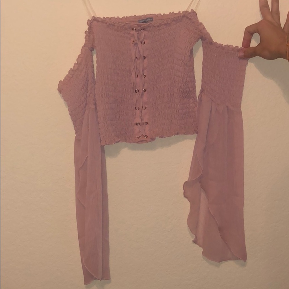 Ruffled pink crop top with sleeves